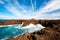 Rocky coast with wavy ocean on Lanzarote island