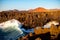 Rocky coast with wavy ocean on Lanzarote island