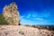 Rocky coastal scene with blue sky