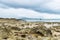 Rocky coastline along cliffs in Santander, Spain