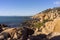 Rocky coastline with Ocean and sandstone rocks