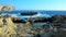 Rocky coastline of San Lawrenz during storm ,Malta