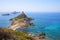 Rocky Coastline. Sanguinaire islands and Parata Tower in Corsica, France.