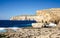 Rocky coastline and sea near collapsed Azure window in Dwejra Bay, Gozo island, Malta