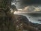 Rocky coastline with stormy clouds on the island of Kauai Hawaii