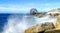 Rocky Coastline with Wave Crashing against the Rocks