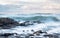 Rocky Flysch cliffs in Basque country beneath stormy sky