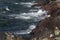 Rocky Fogo Island coastline, crashing waves