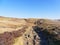 Rocky footpath down a slope on Derwent Moor in Dderbyshire