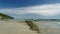 Rocky foreshore on Farewell Spit, on New Zealand`s west coast