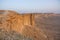 Rocky formation in the desert, Edge of the World in Saudi Arabia (Jebel Fihrayn