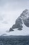 Rocky frozen landscape of Cuverville Island on a stormy day, Southern Ocean, Antarctica