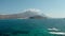 Rocky, green cliff edge, where the land meets the turquoise sea of Greece,Crete