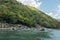 Rocky green hills along Hozugawa River.