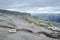 Rocky hike along the fjord to Kjerag boulder, Norway