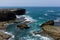 Rocky lagoon on a background of blue skyline