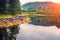 Rocky lakeshore of a calm mountain lake