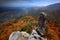 Rocky landscape during autumn. Beautiful landscape with stone, forest and fog. Sunset in Czech national park Ceske Svycarsko. Mist