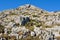 Rocky landscape topped by ruins of fortified castle located on t