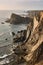 Rocky littoral near the Arrifana Fortress on the west of the Atlantic Ocean, Portugal