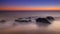 Rocky long exposure seascape sunrise