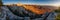 Rocky mountain range at sunrise, panorama