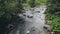 Rocky mountain river fast stream creek with rapids