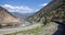 Rocky Mountaineer luxury train rounding bend along the Fraser River in the Rocky Mountains, British Columbia, Canada