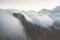 Rocky Mountains cliff and clouds storm Landscape