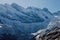 Rocky mountains with glacier and snow. Mountain and ice glacier in Dombay