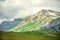 Rocky Mountains landscape with moody clouds sky