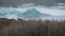 Rocky ocean coast, dramatic sea waves, Monterey beach, California, birds flying.