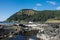 Rocky ocean shoreline during low tide at the Scenic Cape Perpetua