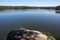 Rocky Overlook on a Calm Lake