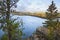 Rocky overlook of northern Minnesota lake with pines and birch during autumn