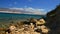 Rocky part of bay beach Sveta Maria in center of Pag island, opposite shore southern of Skrivena Plaza visible