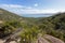 Rocky path and vegetation along trail up to Wineglass Bay lookout, View of Coles Bay, Tasmania island, Australia