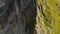 Rocky peak of giant Seceda mountain overgrown with grass