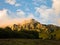 Rocky peaks at foggy sunrise, trekking path at Suva Planina mountain