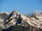 Rocky peaks and stones with snow in Caucasian mountains in Georgia