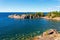 Rocky peninsula with pine trees in Lake Superior