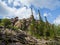 Rocky ridge in the taiga on an autumn sunny day