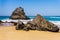 Rocky sandy beach on Atlantic ocean rocky coastline of Adraga beach