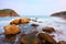 Rocky sea coast and blurred water in shek o