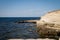 Rocky seashore in summer on a sunny day