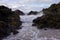 Rocky seashore with waves at Port Macquarie Australia