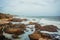 The rocky shore of the Indian Ocean in the city of Kanyakumari