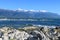 Rocky shore sea and snow capped mountains Kaikoura