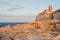 Rocky shore of Valleta with city walls and beautiful landscape. Coastline of Malta