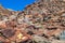 Rocky slope with hiking marking in Parc Natural Comunal de les Valls del Comapedrosa national park in Andor